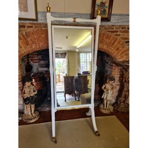 804 - A 19TH CENTURY CHEVAL MIRROR
The later white painted frame with turned finials and columns holding a... 