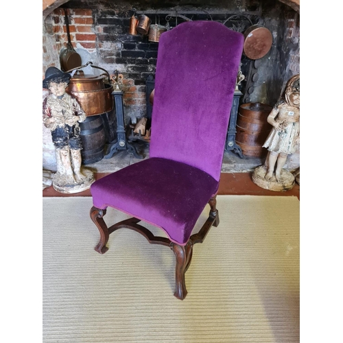 805 - AN 18TH CENTURY WALNUT STANDARD CHAIR
Upholstered in a purple fabric, raised on square cabriole legs... 