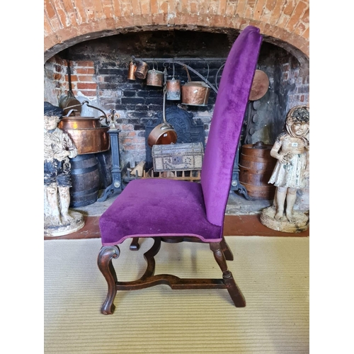 805 - AN 18TH CENTURY WALNUT STANDARD CHAIR
Upholstered in a purple fabric, raised on square cabriole legs... 