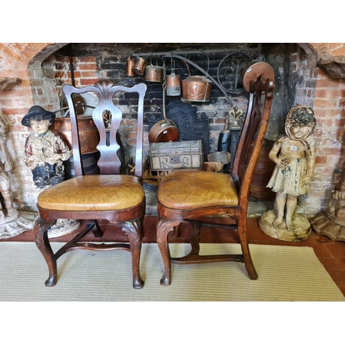 807 - A RARE PAIR OF EARLY/MID 18TH CENTURY IRISH WALNUT STRETCHER CHAIRS
With shaped rails centred with a... 