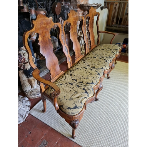 809 - AN 18TH CENTURY IRISH WALNUT CHAIR BACK THREE SEAT SETTEE
With carved and plain panelled back splats... 