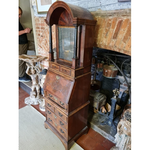 810 - AN EARLY 18TH CENTURY AND LATER OLIVE WOOD AND WALNUT BUREAU CABINET
Of narrow per portions, the dom... 