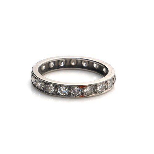 399 - A WHITE METAL AND OLD CUT DIAMOND FULL ETERNITY RING
(size P).
(approx diamond weight 1.33ct, tests ... 