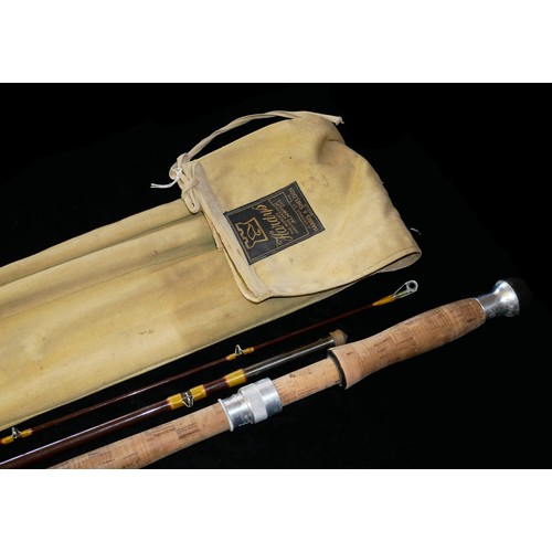 415 - HARDY, A VINTAGE FISHING ROD
Three sections titled 'Salmon Fly', with cork handle and canvas bag. 
(... 