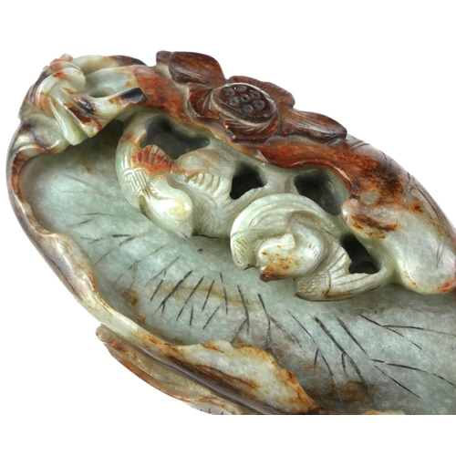 443 - A CHINESE LATE MING/EARLY QING DYNASTY JADE SCULPTURE
With organic form decoration of a pair of bird... 