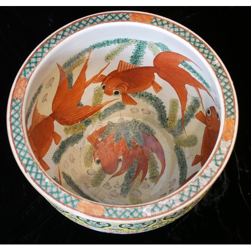 407 - A LARGE 19TH CENTURY CHINESE QING DYNASTY FISH JARDINIÈRE
Polychrome decorated with stylized foliage... 