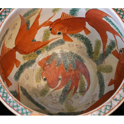 407 - A LARGE 19TH CENTURY CHINESE QING DYNASTY FISH JARDINIÈRE
Polychrome decorated with stylized foliage... 