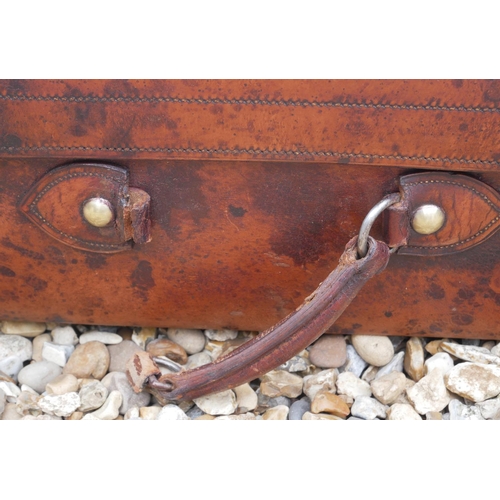 571 - DREW & SONS, LEADENHALL, LONDON, A VINTAGE TAN LEATHER SUITCASE
With polished brass lever locks, sta... 