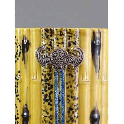 429 - A PAIR OF TALL CYLINDRICAL YELLOW BISCUIT ‘BAMBOO’ HAT STANDS, CIRCA 1900
Each carved and painted as... 