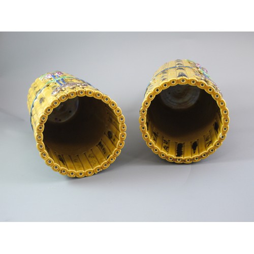 429 - A PAIR OF TALL CYLINDRICAL YELLOW BISCUIT ‘BAMBOO’ HAT STANDS, CIRCA 1900
Each carved and painted as... 