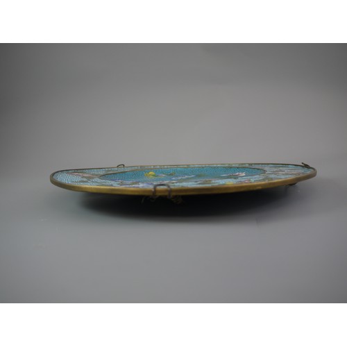 430 - A CHINESE JIAQING PERIOD CLOISONNÉ PLATE
Decorated with central flowering branches and butterfly on ... 