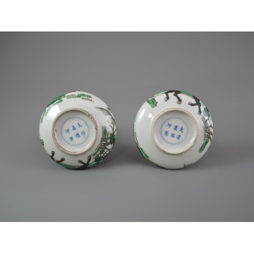 433 - A PAIR OF SMALL LATE 19TH CENTURY FAMILLE VERTE BOTTLE VASES
Each with body of compressed form risin... 