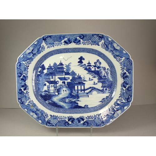 434 - A GOOD PAIR OF BLUE AND WHITE QIANLONG ‘LANDSCAPE’ MEAT DISHES
Both with a well painted central meda... 