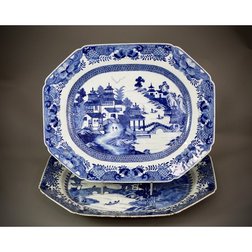 434 - A GOOD PAIR OF BLUE AND WHITE QIANLONG ‘LANDSCAPE’ MEAT DISHES
Both with a well painted central meda... 