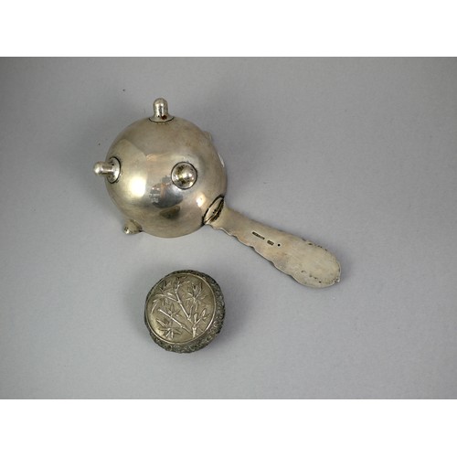 436 - A SILVER TRIPOD TEA STRAINER 
With fine dragon handle in low relief, marked ‘Tuck Chang’, along with... 