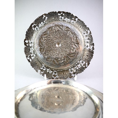 438 - A GOOD SILVER DISH WITH ROPE TWIST RIM
Incised foliage scrolls overall, mark erased, along with a la... 