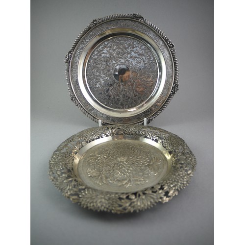 438 - A GOOD SILVER DISH WITH ROPE TWIST RIM
Incised foliage scrolls overall, mark erased, along with a la... 