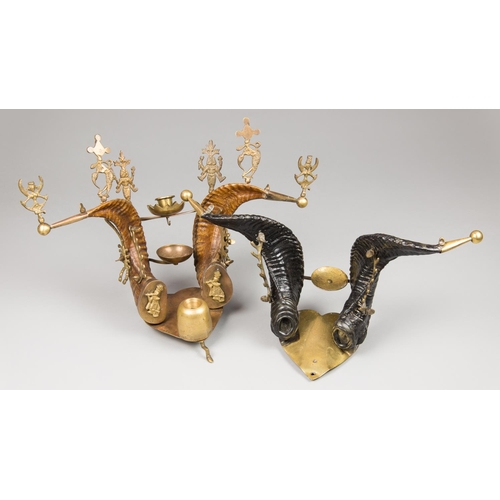 52 - TWO LATE 19TH CENTURY ANGLO-INDIAN RAMS HORN INKWELLS. The largest (w 43cm).