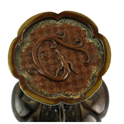 140 - A LATE 19TH/EARLY 20TH CENTURY CHINESE EXPORT BRONZE TWIN HANDLED ‘GU’ FORM VASE/RITUAL VESSEL
Decor... 