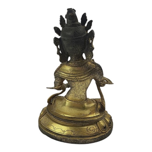 39 - A GILT BRONZE SEATED BUDDHA.
(h 22cm)

Condition: good