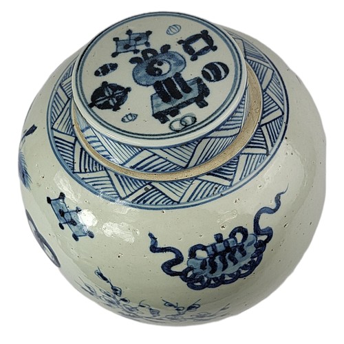 10 - A LARGE BLUE AND WHITE POTTERY CHINESE QING DESIGN GINGER JAR
Decorated with hand painted motifs.
(2... 