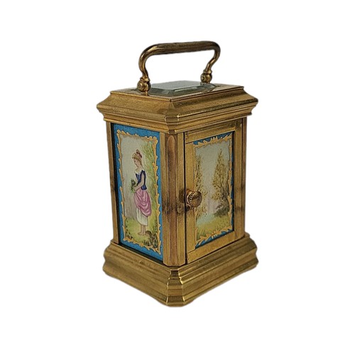 84 - A MINIATURE SÈVRES STYLE FRENCH PORCELAIN AND POLISHED BRASS CARRIAGE CLOCK 
Having a glass top and ... 