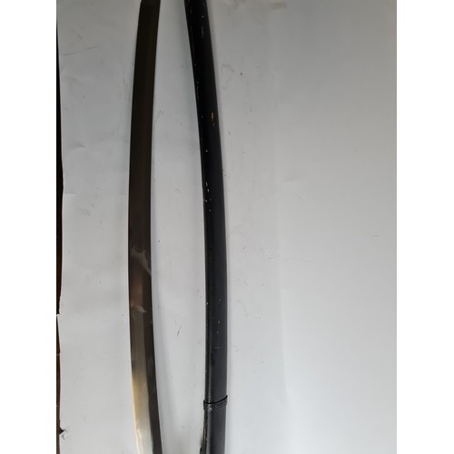 100 - A JAPANESE GUNTO SWORD
Bronze mounts, ebonised wood scabbard.
(length 96cm)

Condition: good, light ... 