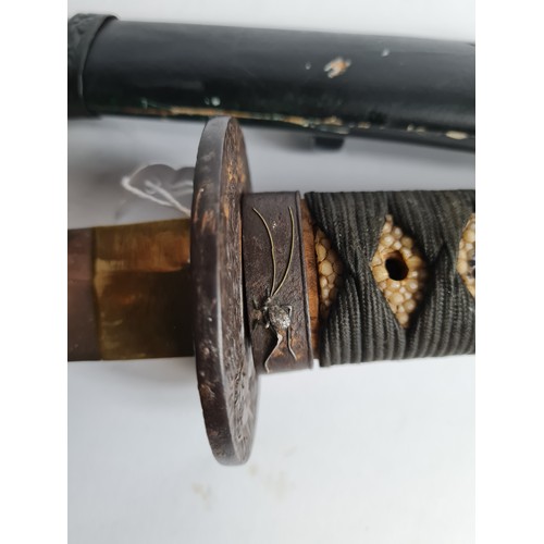 100 - A JAPANESE GUNTO SWORD
Bronze mounts, ebonised wood scabbard.
(length 96cm)

Condition: good, light ... 