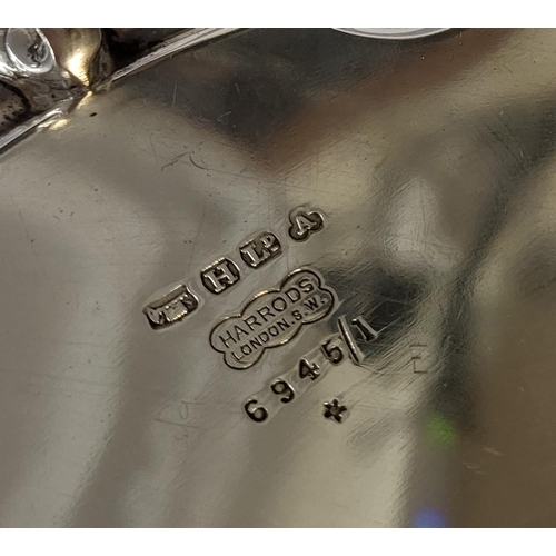 50 - HARRODS, AN EARLY 20TH CENTURY SILVER PLATE SALVER 
Together with a pair of heavy plated galloping h... 