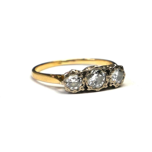 47 - AN EARLY 20TH CENTURY 18CT GOLD AND DIAMOND THREE STONE RING
Graduated stones in an illusion set mou... 