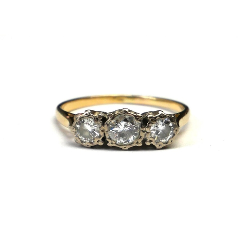 47 - AN EARLY 20TH CENTURY 18CT GOLD AND DIAMOND THREE STONE RING
Graduated stones in an illusion set mou... 