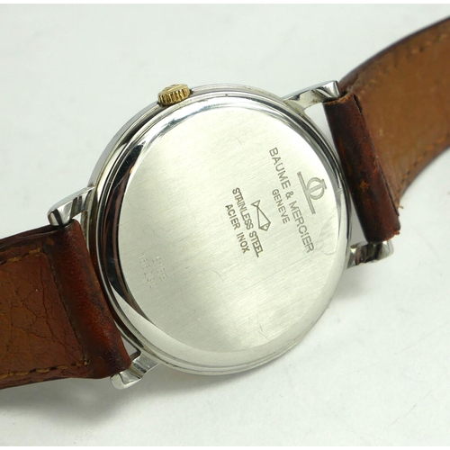 59 - BAUME AND MERCIER, AN 18CT GOLD PLATE AND STAINLESS STEEL TRIPLE CALENDAR MOONPHASE GENT’S WRISTWATC... 