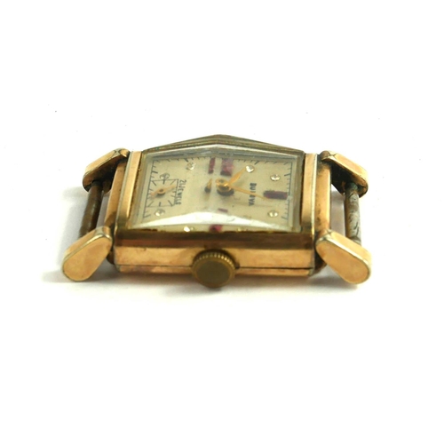 63 - BULOVA, AN ART DECO GOLD PLATED GENT’S WRISTWATCH
Rectangular tank form with stepped glass, white di... 