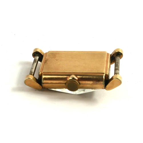 63 - BULOVA, AN ART DECO GOLD PLATED GENT’S WRISTWATCH
Rectangular tank form with stepped glass, white di... 