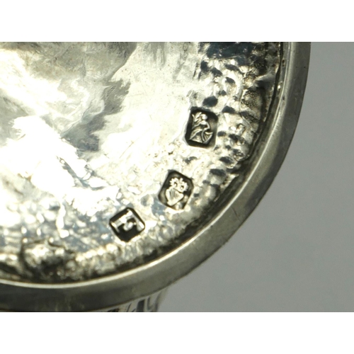 20 - A GEORGIAN IRISH SILVER OVAL SUGAR BASIN
With embossed floral decoration and cartouche, on a pedesta... 