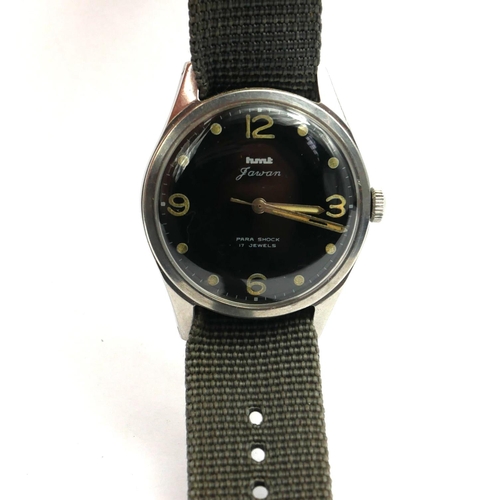 25 - HMT JAWAN, A VINTAGE STAINLESS STEEL MILITARY ISSUE GENT’S WRISTWATCH
Having a circular black dial w... 