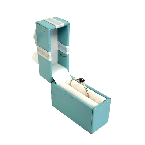 36 - A VINTAGE 9CT GOLD AND SOLITAIRE HEMATITE RING
Having a single cabochon cut stone.
(approx weighs 1g... 