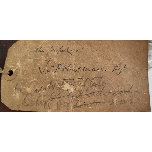 39 - A GEORGIAN SILVER AND CUT GLASS FOUR BOTTLE DECANTER SET
Having a reeded handle, on classical urn fo... 