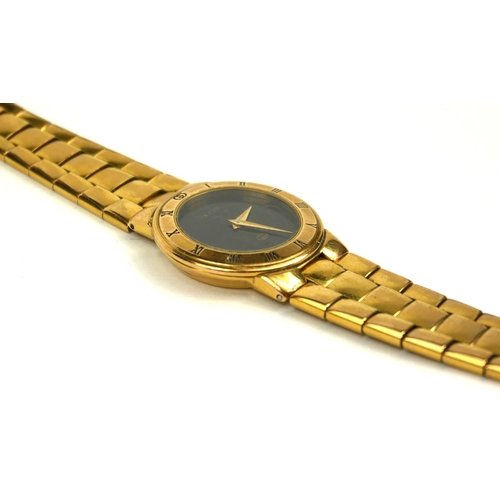 4 - GUCCI, A VINTAGE GOLD PLATED LADIES’ WRISTWATCH
The circular black dial with integral bracelet, mark... 