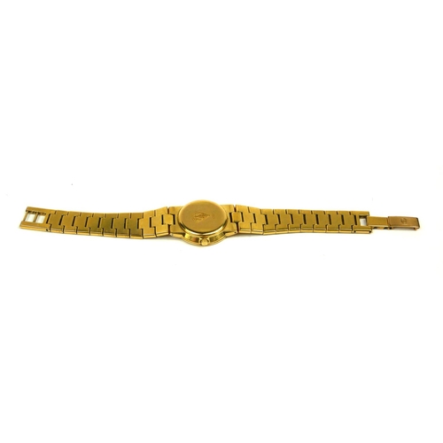 4 - GUCCI, A VINTAGE GOLD PLATED LADIES’ WRISTWATCH
The circular black dial with integral bracelet, mark... 