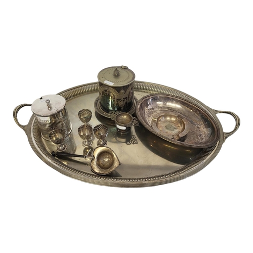 40 - AN EARLY 20TH CENTURY SILVER TEA STRAINER
Having an ebonised turned wooden handle and beaded design ... 