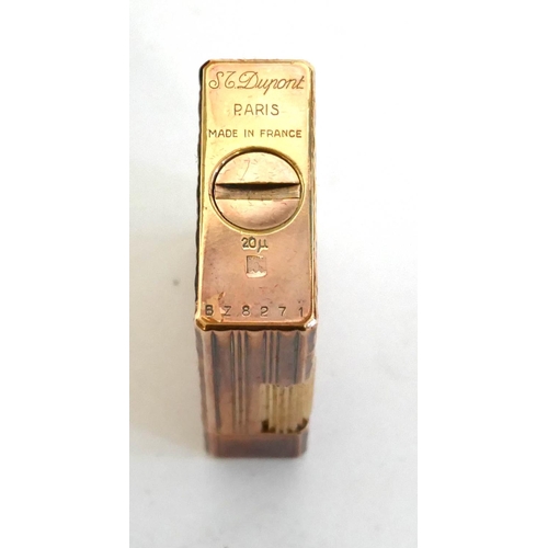 79A - S.T. DUPONT, A VINTAGE GOLD PLATED GAS LIGHTER
Model Ligne1 (line 1), 20 microns, in original box wi... 