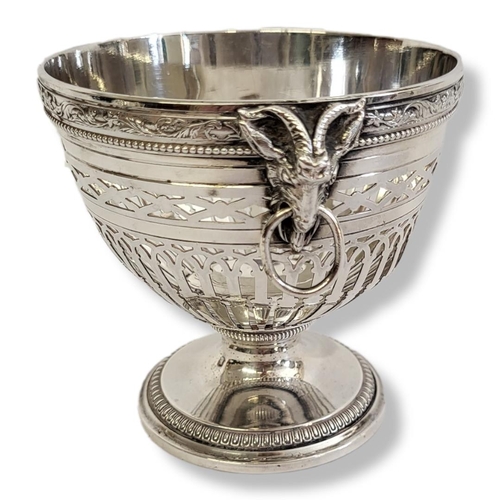 19 - AN EARLY 20TH CENTURY FRENCH SILVER OVAL BONBON BASKET
With classical rams head masks and pierced de... 