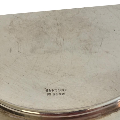 24 - AN EARLY 20TH CENTURY SILVER SWEETMEAT DISH
Having a scrolled edge with pierced design, hallmarked S... 