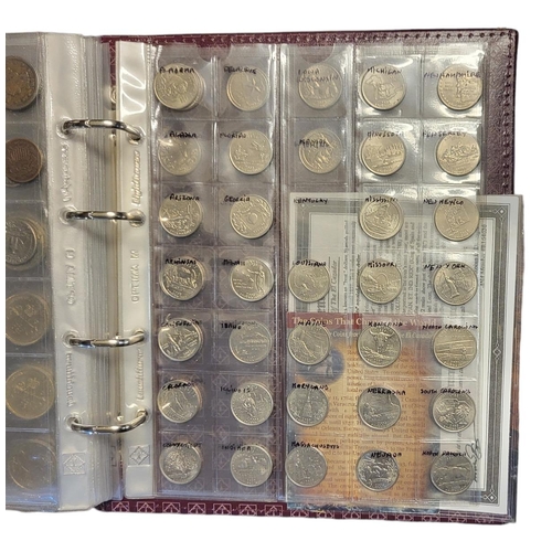 43a - TWO ALBUMS OF 19TH CENTURY BRITISH AND FOREIGN COINS
Including American Half Dollar silver coins, co... 