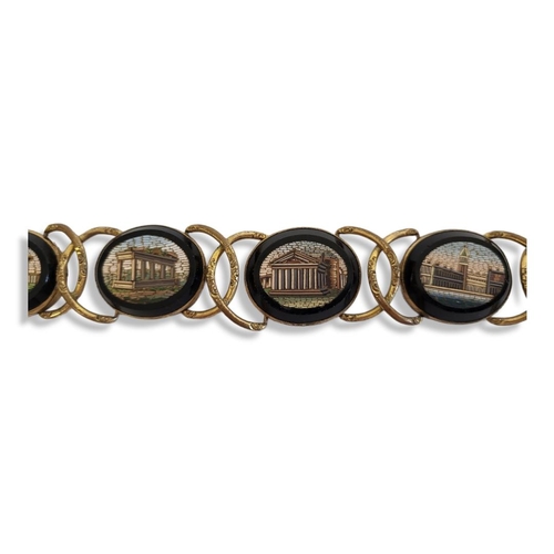 10 - A 19TH CENTURY YELLOW METAL AND MICRO MOSAIC BRACELET
Having five oval form pictorial mosaics set in... 