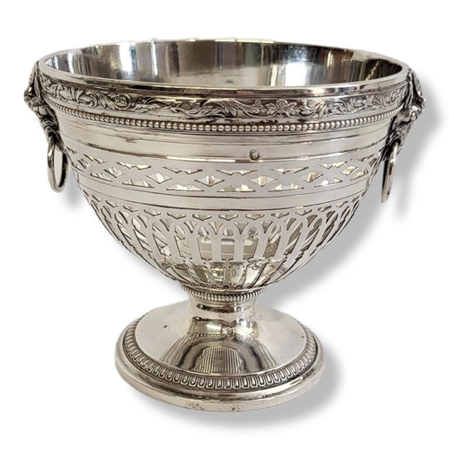 19 - AN EARLY 20TH CENTURY FRENCH SILVER OVAL BONBON BASKET
With classical rams head masks and pierced de... 