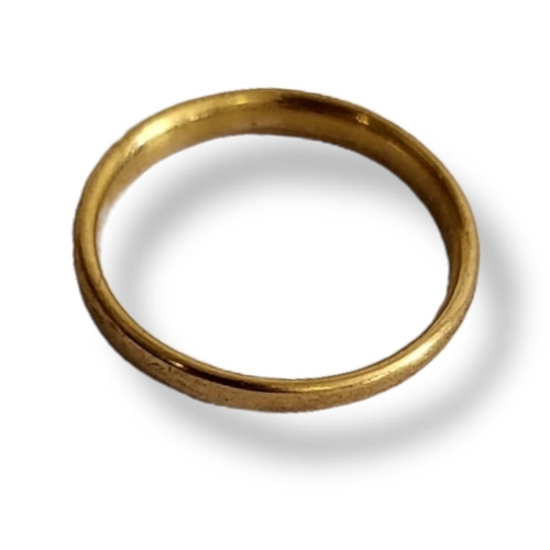 2 - AN EARLY 20TH CENTURY 22CT GOLD WEDDING RING.
(size M/N)

Condition: good