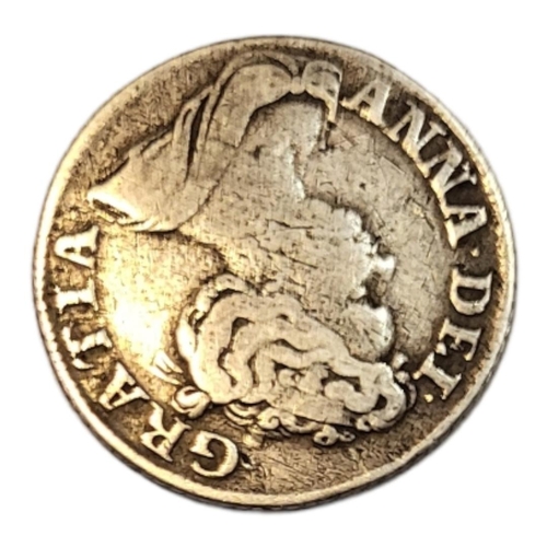 30a - A QUEEN ANNE, 1702 - 1714, A SILVER SHILLING COIN
Having a portrait bust with four shield design to ... 