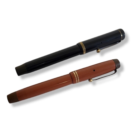 32 - TWO EARLY 20TH CENTURY PARKER 'DUOFOLD' FOUNTAIN PENS
Black cased pen marked 'Geo. S. Parker Toronto... 